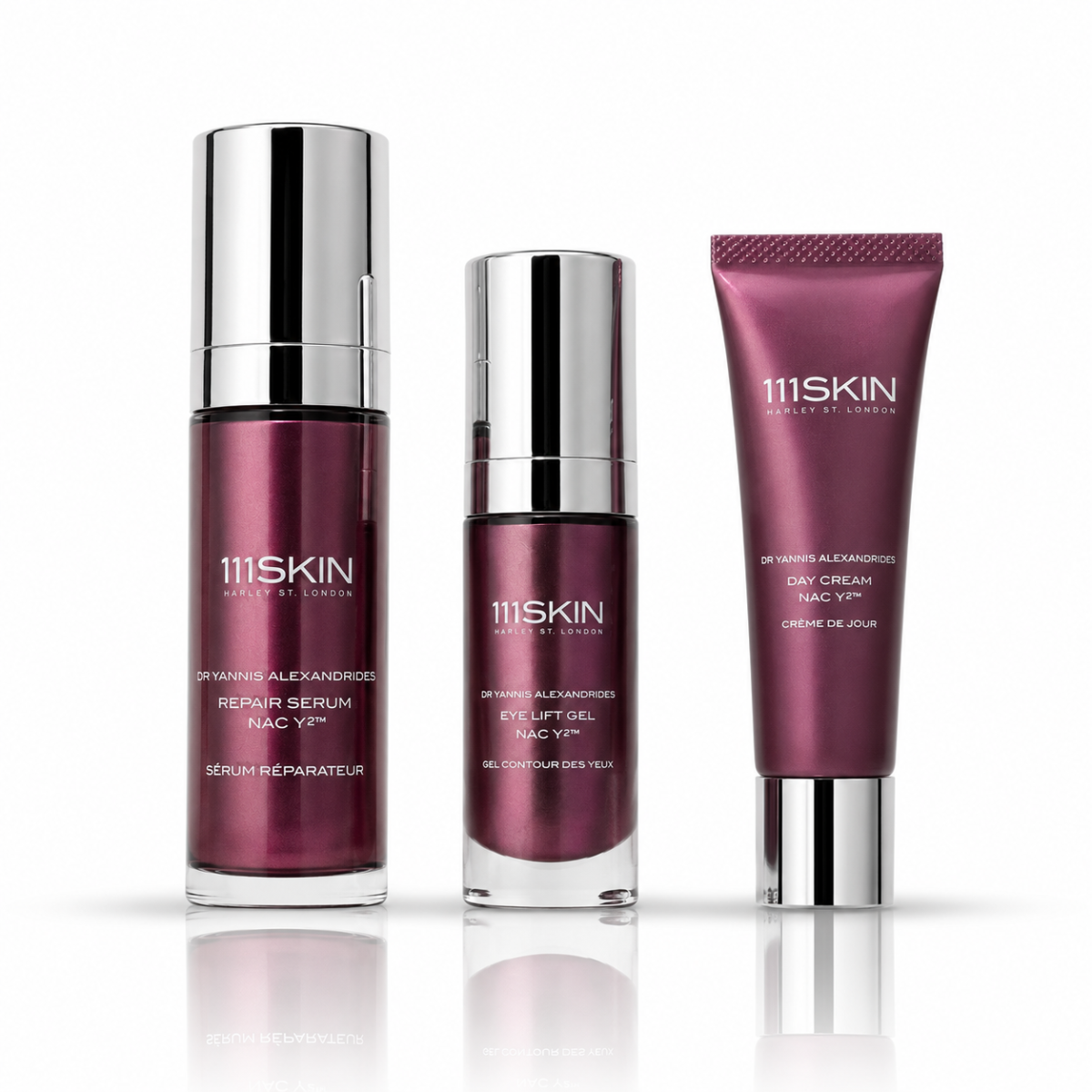Maroon skincare Products on white background reflective bottom