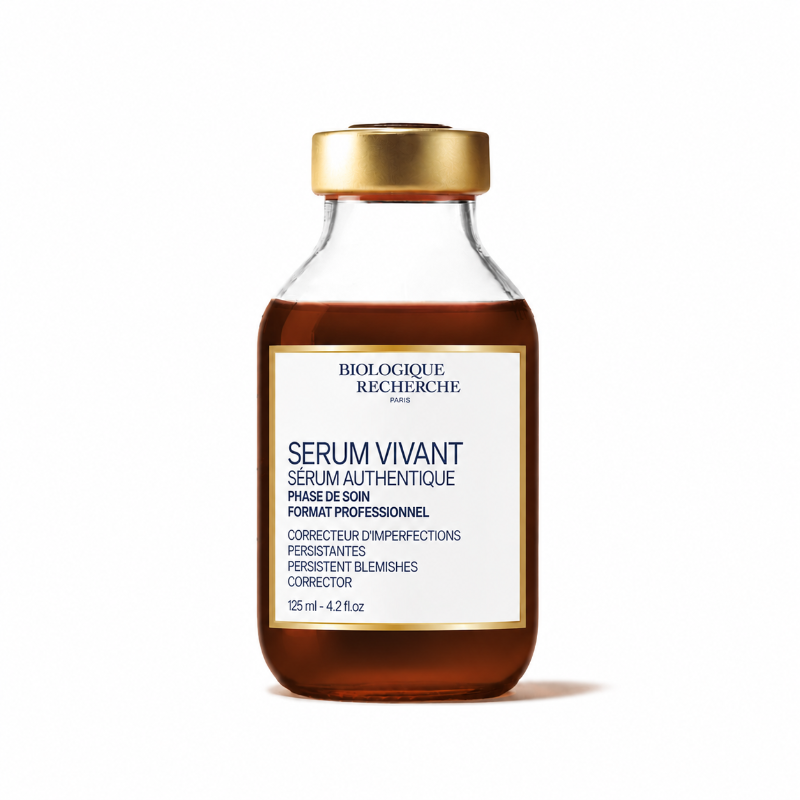 Gold-capped 1 oz glass bottle containing Biologique Recherche Serum Vivant, a brown/amber-colored liquid. On the bottle is a white label with a gold border, featuring text and the Biologique Recherche logo. 