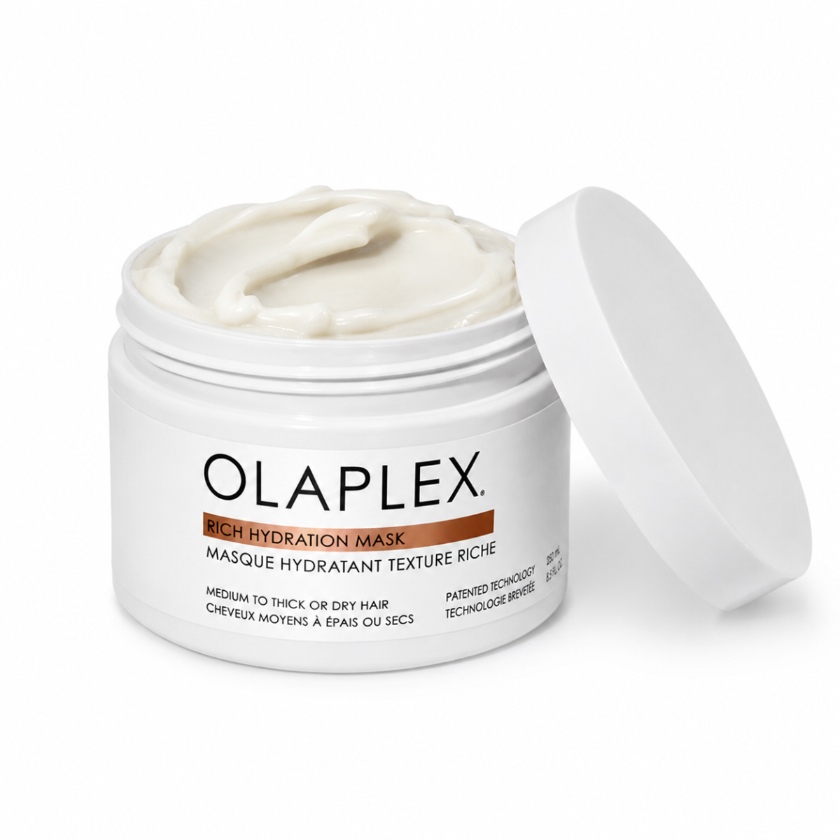Opened product with cream inside on white background