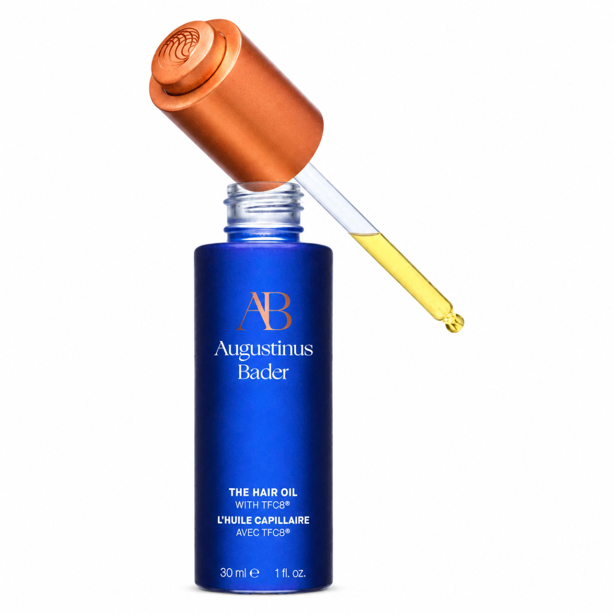 Blue product bottle with dropper filled with yellow liquid on white background